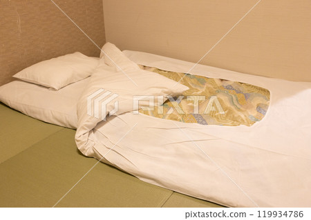 Japanese-style room futon in a hotel Japanese-style room futon in a hotel 119934786