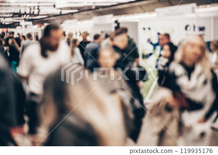 Abstract blurred people at exhibition hall of expo event trade show. Business convention show or job fair. Business concept background 119935176
