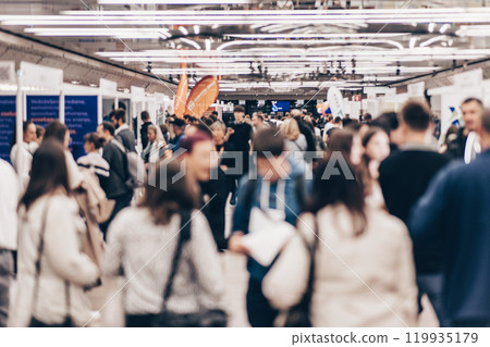 Abstract blurred people at exhibition hall of expo event trade show. Business convention show or job fair. Business concept background Abstract blurred people at exhibition hall of expo event trade show. Business convention show or job fair. Business concept background 119935179