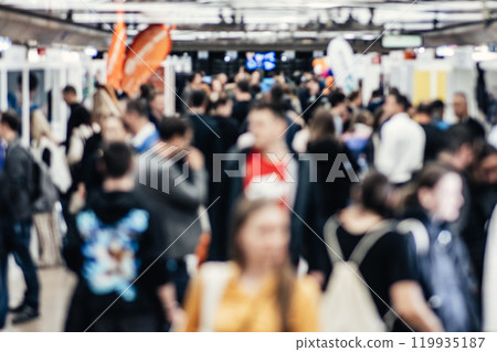 Abstract blurred people at exhibition hall of expo event trade show. Business convention show or job fair. Business concept background Abstract blurred people at exhibition hall of expo event trade show. Business convention show or job fair. Business concept background 119935187