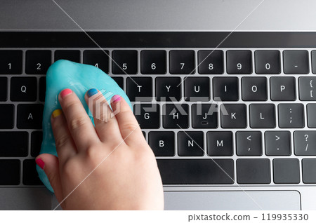 Collecting dust from keyboard Collecting dust from keyboard 119935330