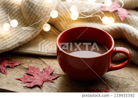 Cup of delicious hot chocolate on wooden table background. Cup of delicious hot chocolate on wooden table background. 119935392