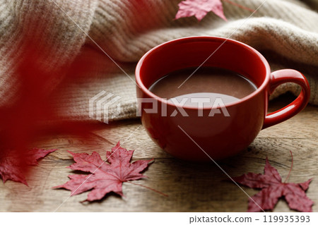 Cup of delicious hot chocolate on wooden table background. Cup of delicious hot chocolate on wooden table background. 119935393