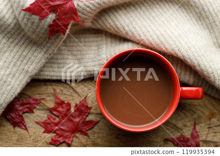 Cup of delicious hot chocolate on wooden table background. Cup of delicious hot chocolate on wooden table background. 119935394