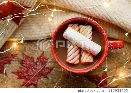 Cup of delicious hot chocolate on wooden table background. 119935405