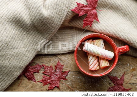 Cup of delicious hot chocolate on wooden table background. Cup of delicious hot chocolate on wooden table background. 119935408