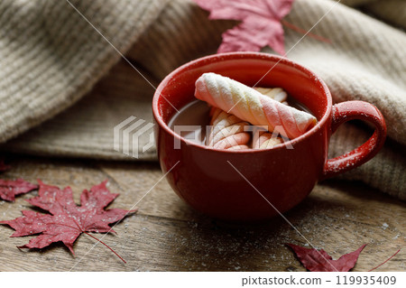 Cup of delicious hot chocolate on wooden table background. Cup of delicious hot chocolate on wooden table background. 119935409