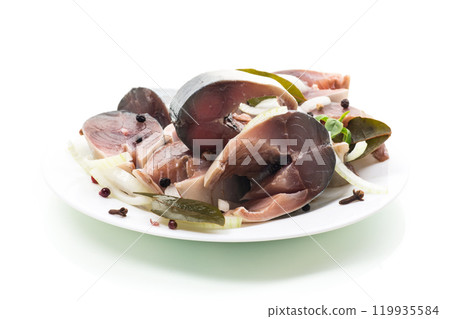 lightly salted mackerel with onions and spices, isolated on white background lightly salted mackerel with onions and spices, isolated on white background 119935584