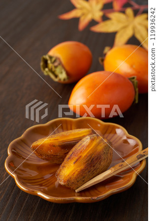 Image of a ripe brush persimmon 119936242