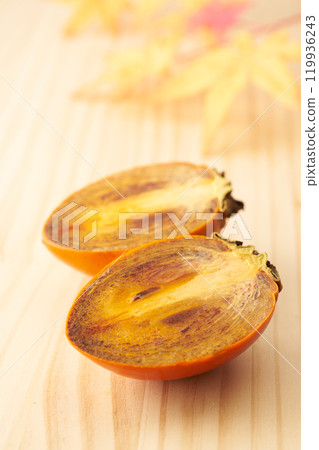 Image of a ripe brush persimmon Image of a ripe brush persimmon 119936243