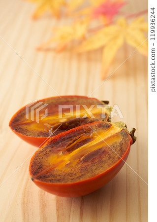 Image of a ripe brush persimmon Image of a ripe brush persimmon 119936244