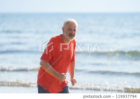 Senior man running on tropical beach Senior man running on tropical beach 119937794
