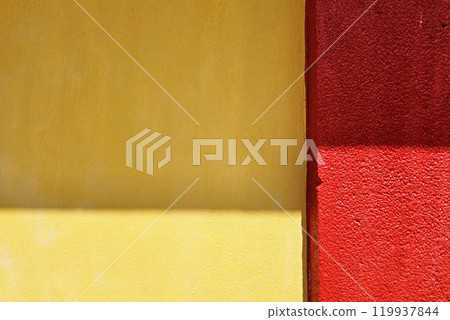 Yellow Concrete Wall and Red Pole with Light Beam and Shadow. Yellow Concrete Wall and Red Pole with Light Beam and Shadow. 119937844