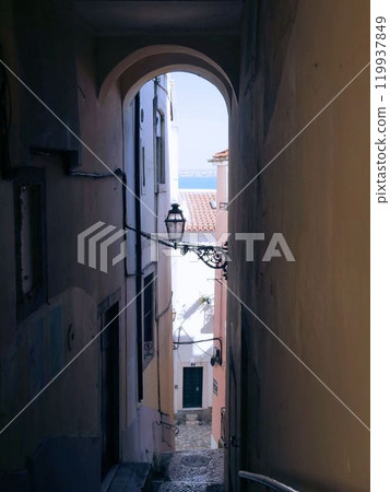 Alley in the Alfama district of Lisbon (Portugal) Alley in the Alfama district of Lisbon (Portugal) 119937849