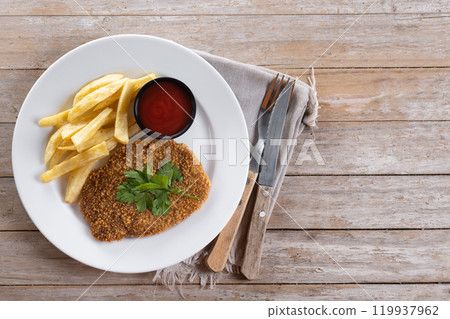 Cachopo, Traditional food in Asturias, Spain. Breaded fillet meat on black slate background 119937962
