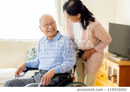 Senior couple, wheelchair, elderly care Senior couple, wheelchair, elderly care 119938082