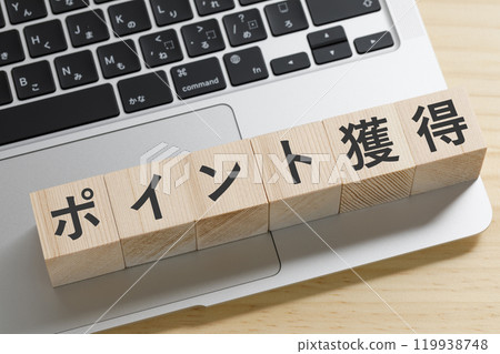 A block of building blocks with the words "Earn points" written on it A block of building blocks with the words "Earn points" written on it 119938748