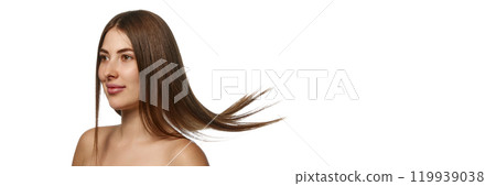 Banner. Woman with smooth, flowing brunette hair against white background with negative space to insert text. Banner. Woman with smooth, flowing brunette hair against white background with negative space to insert text. 119939038