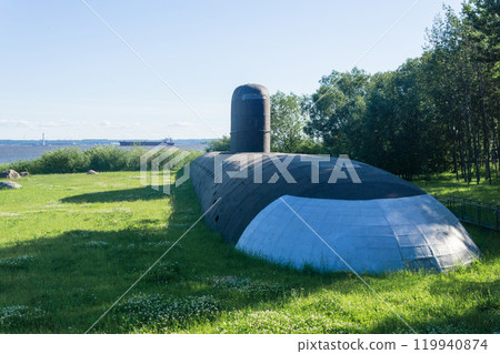 art object, a full-size model of a nuclear submarine on a lawn in a park in Kronstadt 119940874