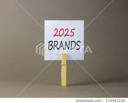 Planning 2025 brands new year symbol. Concept words 2025 Brands on beautiful white paper on wooden clothespin. Beautiful grey background. Business 2025 brands new year concept. Copy space. 119941238