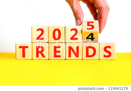 Planning 2025 trends new year symbol. Concept words 2024 Trends to 2025 Trends on beautiful wooden blocks. Beautiful yellow table white background. Business 2025 trends new year concept. Copy space. 119941279
