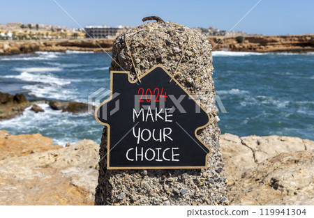 2024 Make your choice symbol. Concept words 2024 Make your choice on beautiful black chalk blackboard. Beautiful stone blue sea sky background. Business 2024 Make your choice concept. Copy space 119941304