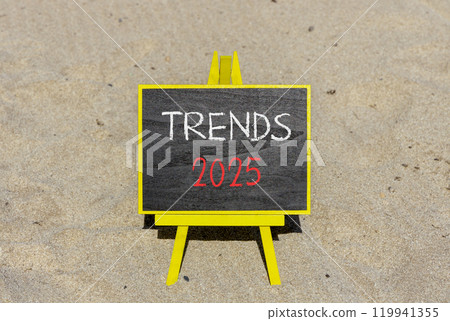 Planning trends 2025 new year symbol. Concept words Trends 2025 on beautiful yellow chalk blackboard. Beautiful sand beach background. Business trends 2025 new year concept. Copy space. 119941355
