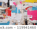 Urban Tapestry A Visual Symphony of Old Wrinkled Grunge Ripped Torn Placard Posters Background, Featuring Weathered Advertising Poster Pieces in White, Pink, Blue, and Yellow Colors on a Wall.. 119941460