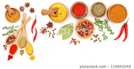 mix of spices in wooden spoon isolated on a white background with copy space for your text. Top view. Flat lay. Set or collection 119942048