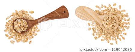Oat flakes in wooden spoon isolated on white background with full depth of field. Top view. Flat lay Oat flakes in wooden spoon isolated on white background with full depth of field. Top view. Flat lay 119942086