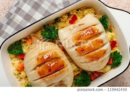 stuffed squid carcasses, baked in the oven, fried, with couscous, top view, homemade, no people, 119942430