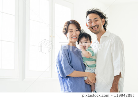 A family cuddling with a smile 119942895