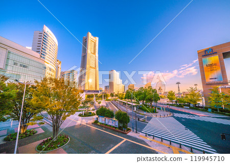 Yokohama cityscape in Japan. The Yokohama Landmark Tower reflecting the morning sun and Sakuragicho Station in the early morning. A ray of hope for tomorrow...November 3rd Yokohama cityscape in Japan. The Yokohama Landmark Tower reflecting the morning sun and Sakuragicho Station in the early morning. A ray of hope for tomorrow...November 3rd 119945710