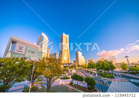 Yokohama cityscape in Japan: Yokohama Landmark Tower reflecting the morning sun and Sakuragicho Station in the early morning. A shining light of hope...November 3rd 119945712