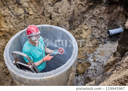 Cement dust enters respiratory tract of worker who cuts concrete without respirator. Cement dust enters respiratory tract of worker who cuts concrete without respirator. 119945967