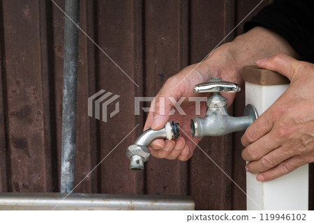 Old water faucet spout removed 119946102