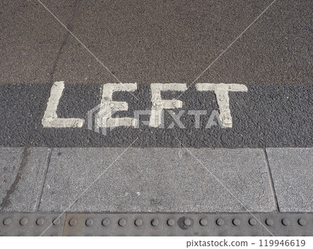 left sign painted on tarmac 119946619