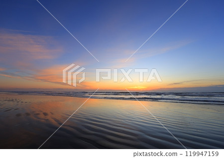 beautiful beach sunrise 119947159