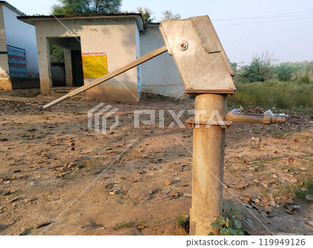 Constructed Indian Hand Pump Borewell in a Rural school in India. Water pump machine from a government school Borehole Water Point 119949126