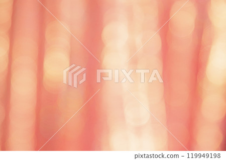 Defocused peach glitter background with sparkles. Defocus light is yellow and orange. Defocused peach glitter background with sparkles. Defocus light is yellow and orange. 119949198
