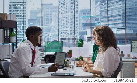 Recruiter narrowing the job search to the last two women applicants, interviewing both of them and making the right choice for the future of the company. HR manager hiring a skilled person. Camera B. Recruiter narrowing the job search to the last two women applicants, interviewing both of them and making the right choice for the future of the company. HR manager hiring a skilled person. Camera B. 119949551