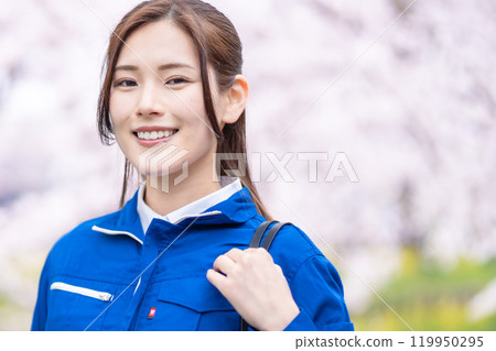 A young female worker excited about her new life A young female worker excited about her new life 119950295