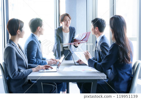 Business people having a meeting in a conference room Business people having a meeting in a conference room 119951139