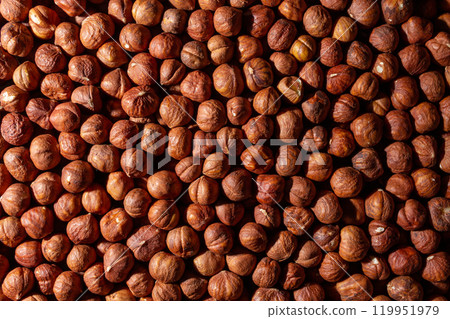 Scattered Peeled Hazelnut. Background from Hazelnuts Scattered Peeled Hazelnut. Background from Hazelnuts 119951979