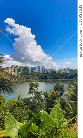 Lake with greenish water surrounded by plants. Lake Sebu. Mindanao, Philippines. Lake with greenish water surrounded by plants. Lake Sebu. Mindanao, Philippines. 119953632