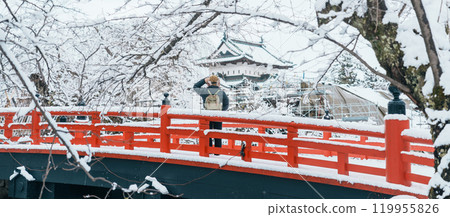 Woman tourist sightseeing Hirosaki Castle in winter, happy traveler travel Hirosaki city, Aomori Prefecture, Tohoku, Japan. Landmark and famous for tourist attraction. Japan travel and vacation 119955826