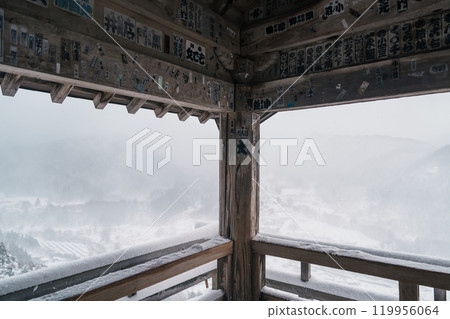 view of village with snow in winter from mountain viewpoint of Yamadera temple, the popular name for the Buddhist temple of Risshakuji located in Yamagata City, in Yamagata Prefecture, Tohuku, Japan 119956064