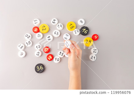 Mathematics activity for kids with bottle caps with multiplication facts, hands-on learning practice, fun way to memorize times tables for elementary school students, educational game, numeracy Mathematics activity for kids with bottle caps with multiplication facts, hands-on learning practice, fun way to memorize times tables for elementary school students, educational game, numeracy 119956076