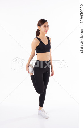 Portrait young asian woman in sportswear stretching muscle leg for health isolated. 119956650