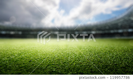 Empty football stadium with green field and blue sky. The field is ready for a game Empty football stadium with green field and blue sky. The field is ready for a game 119957786